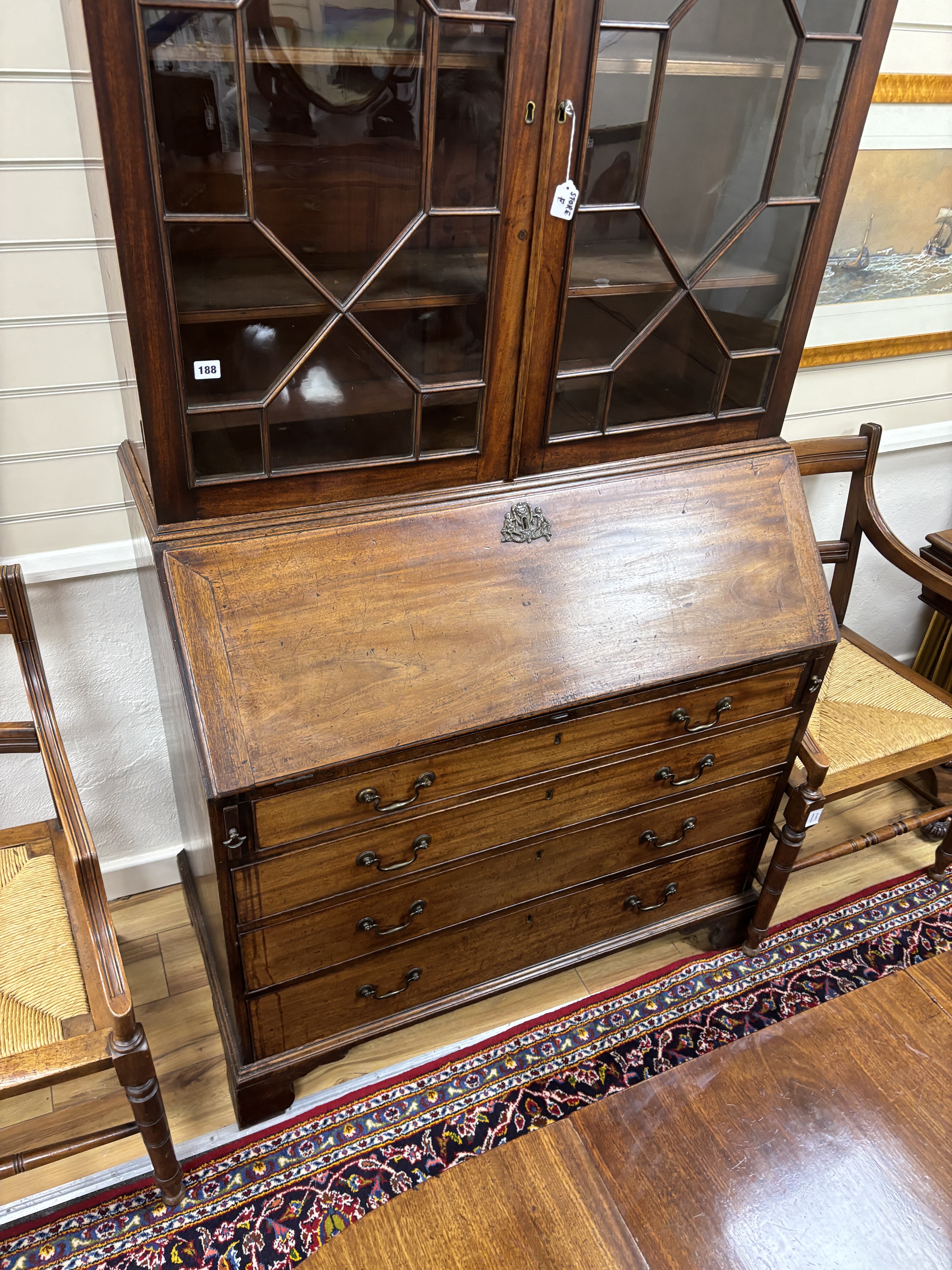 A George III mahogany bureau bookcase, width 107cm, depth 54cm, height 210cm